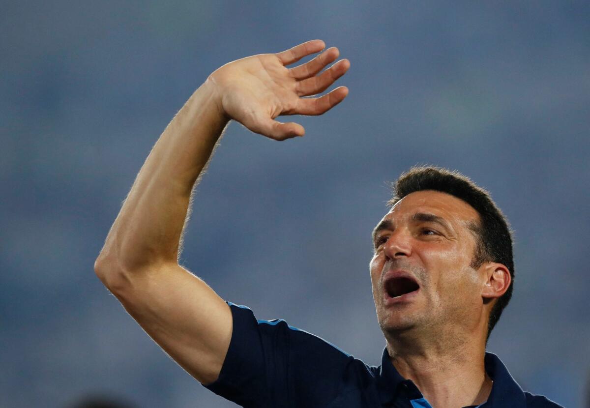 Argentina coach Lionel Scaloni got emotional during his speech. — Reuters