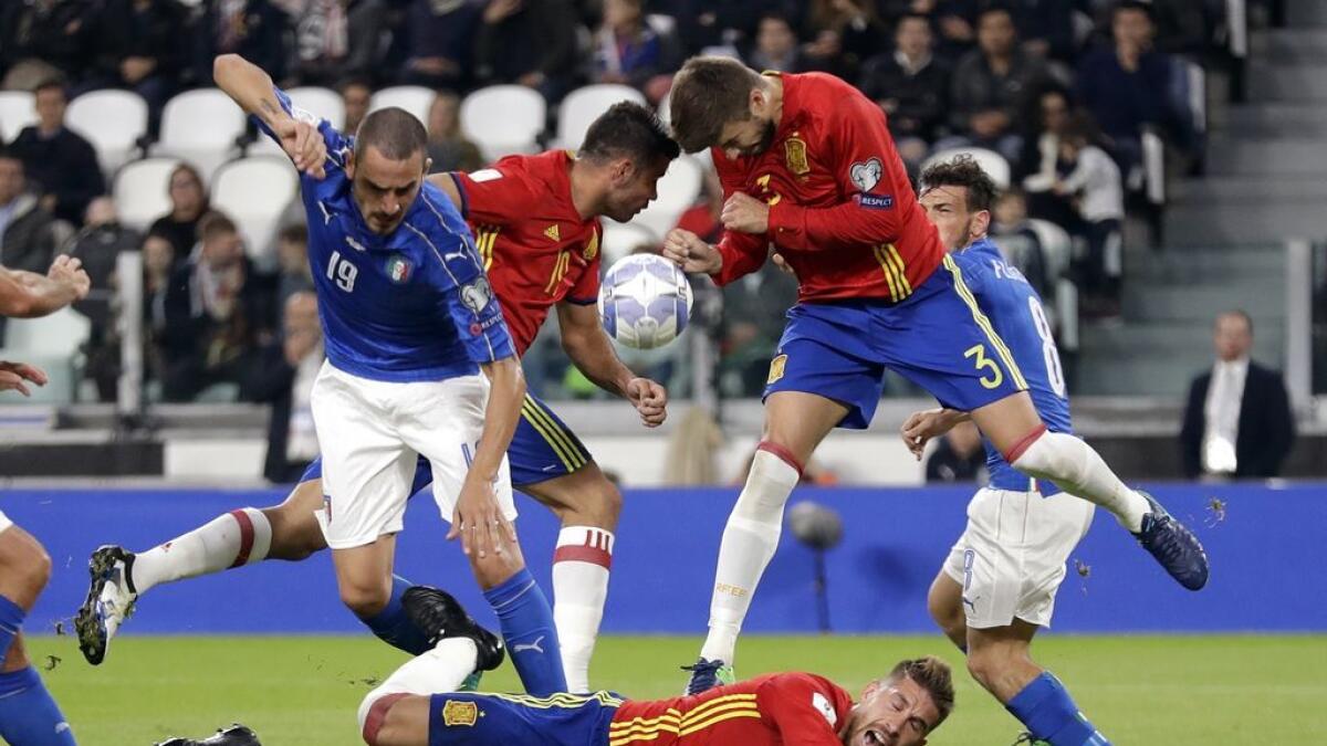 Struggling Italy hold Spain; Wales denied in Austria
