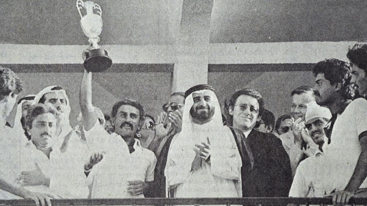The Indian team celebrate with the trophy after winning the inaugural Asia Cup tournament at the Sharjah Cricket Stadium in 1984. (From Khaleej Times archives)