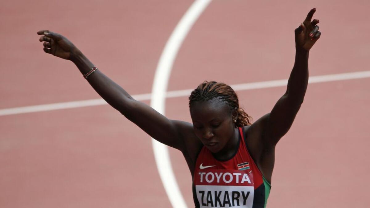Joyce Zakary of Kenya gestures after her womens 400 metres heat at the 15th IAAF World Championships at the National Stadium in Beijing, China August 24, 2015. 