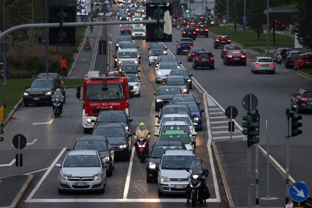 View shows cars waiting in traffic on a road near Porta Nuova district in Milan, Italy, on October 25, 2023. — Reuters file photo used for illustrative purpose only