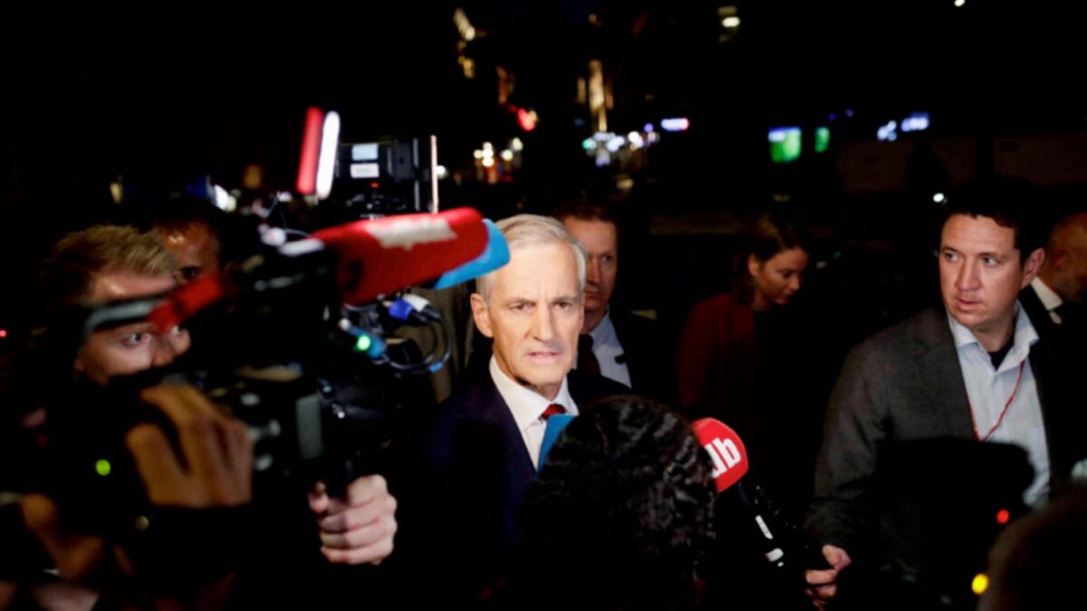 Labour leader Jonas Gahr Store makes his way to the Labor Party's election event in Folkets Hus in Oslo. — AFP