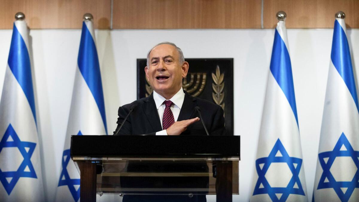Israeli Prime Minister Benjamin Netanyahu delivers a statement at the Knesset (Israel's parliament) in Jerusalem, December 22, 2020.