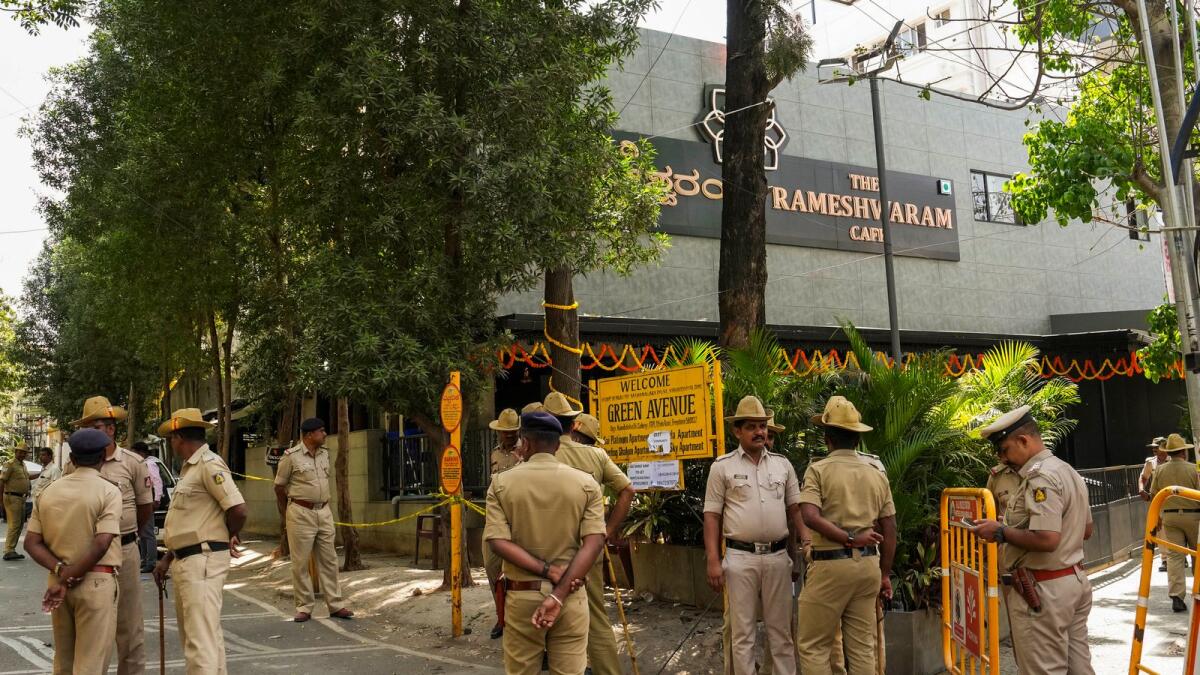 Security personnel stand guard at the Rameshwaram cafe blast site in Bengaluru. Photo: PTI file