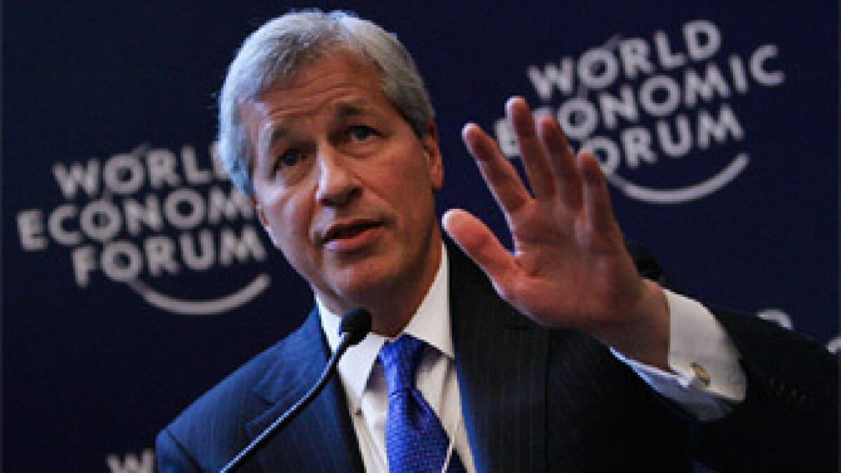 Subdued Dimon is confronted over $2B trading loss