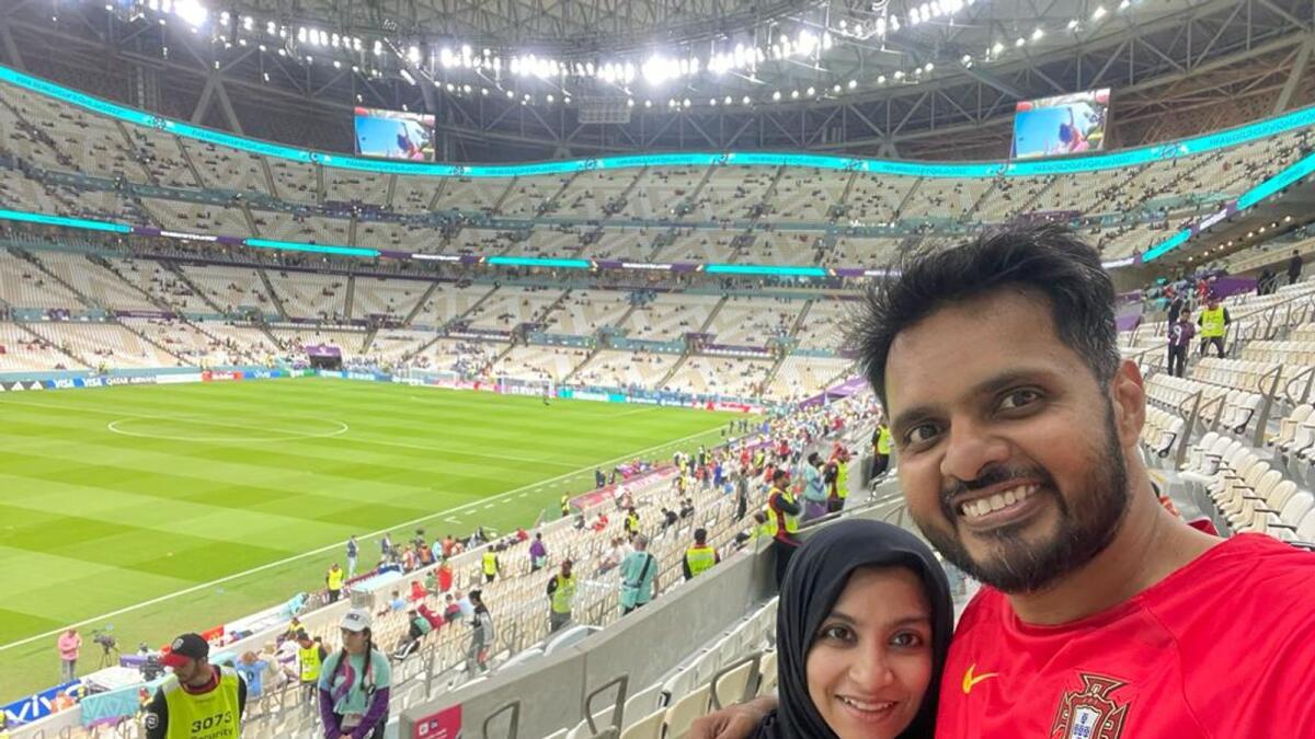 Shabna poses with her husband inside the stadium.