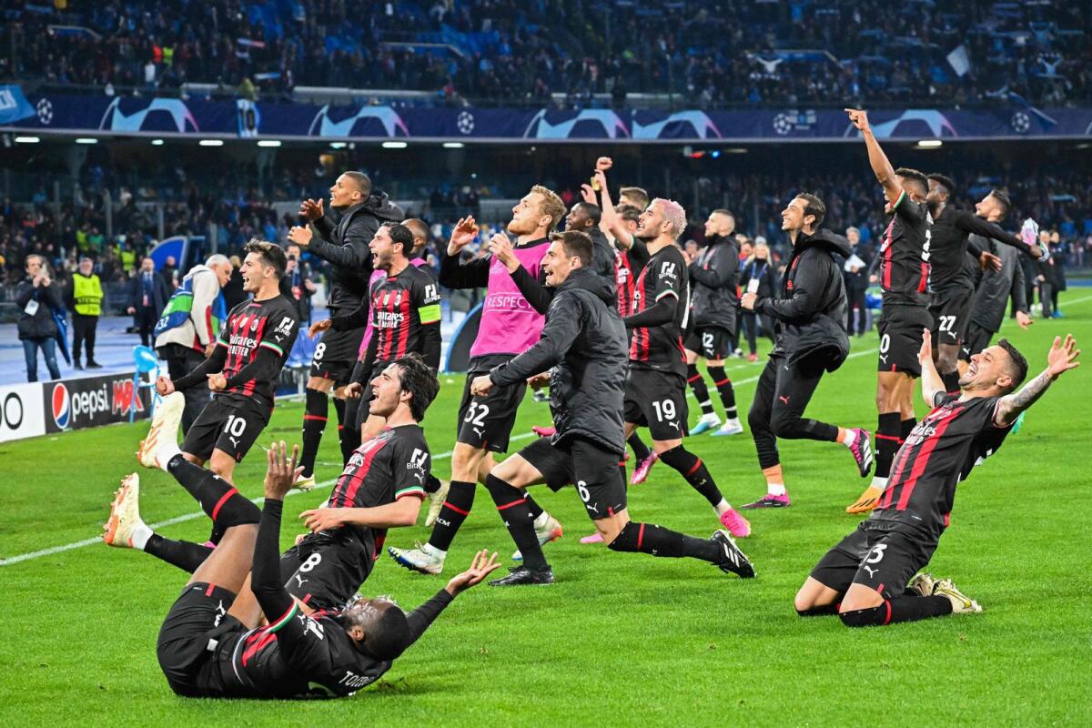 AC Milan players celebrate after reaching the Champions League semifinals. — AFP