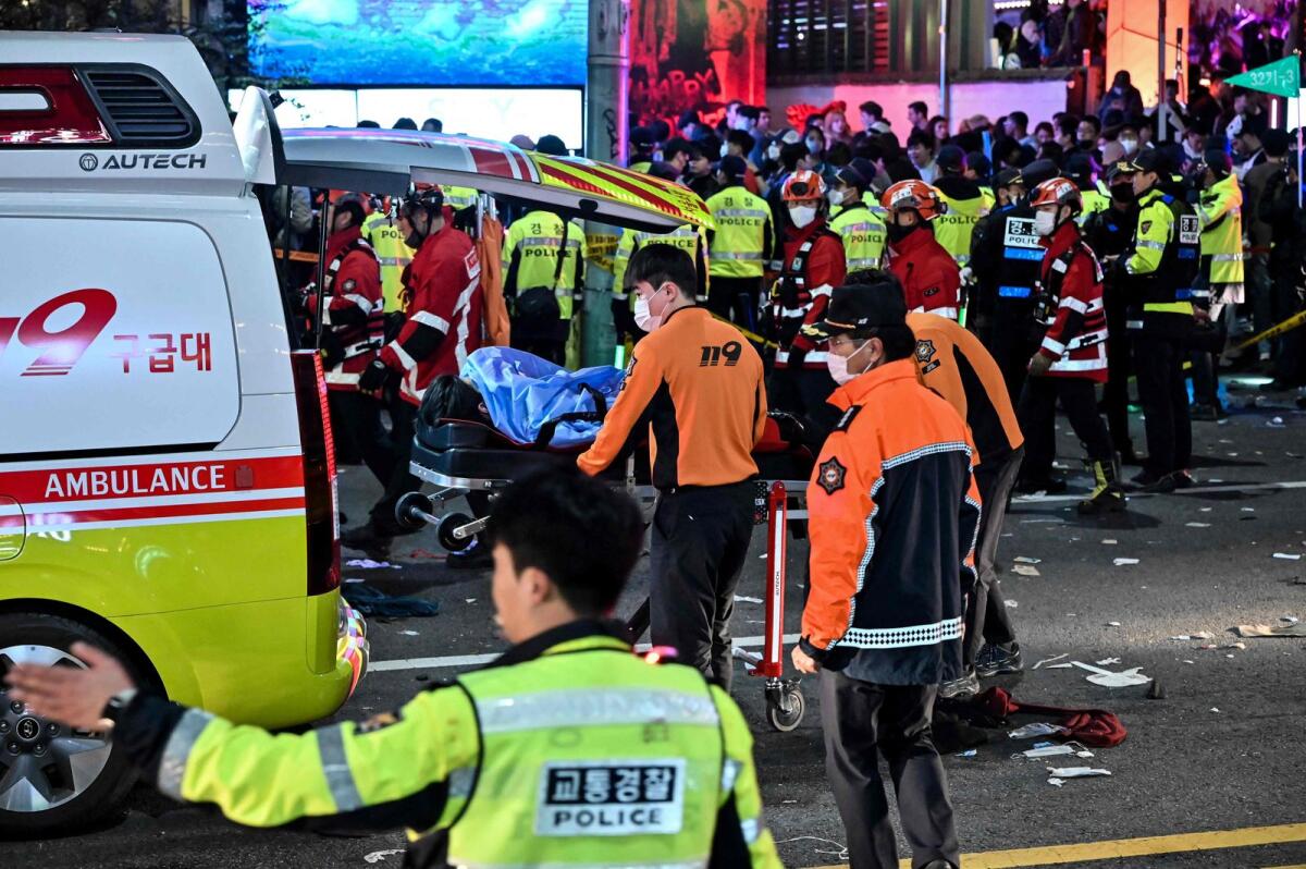 Paramedics attend to a victim believed to have suffered from cardiac arrest. Photo: AFP