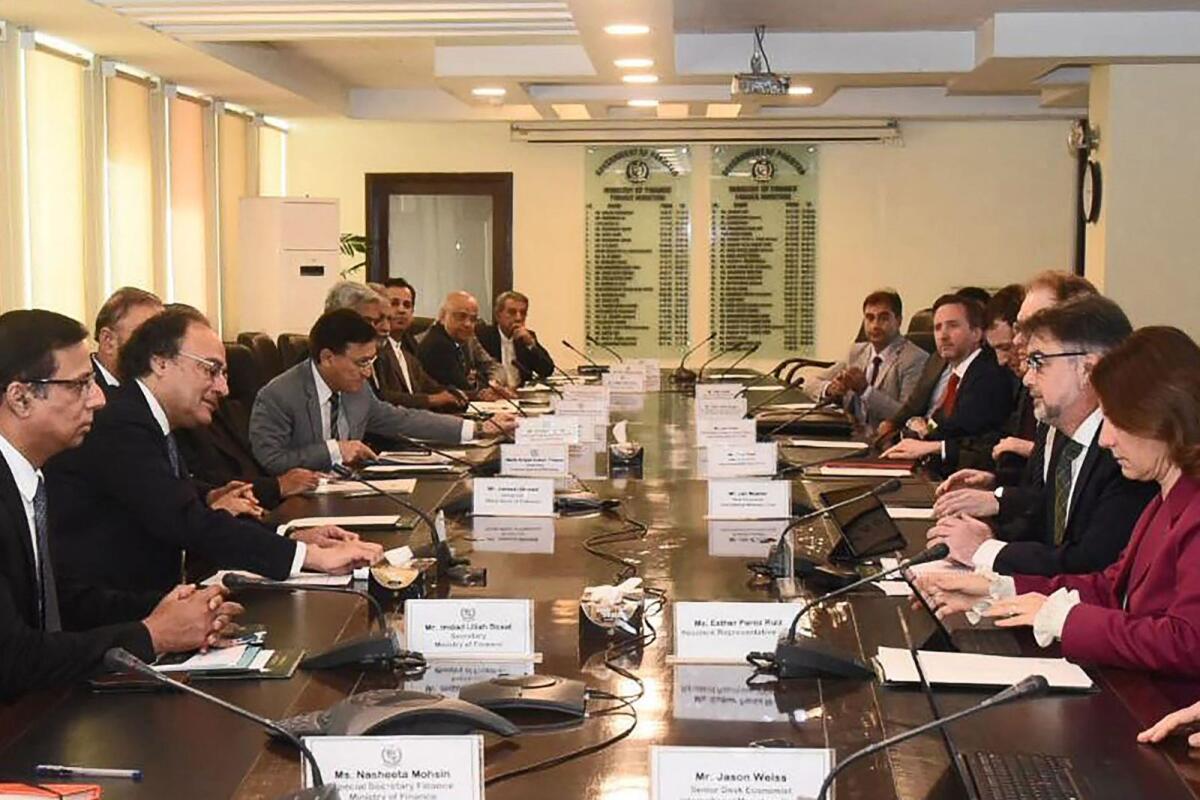 Pakistan government and IMF authorities during a meeting in Islamabad on March 14. Photo: AFP / Pakistan Press Information Department