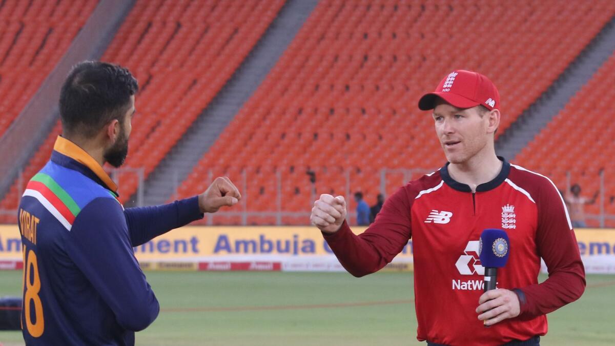 England captain Eoin Morgan and Indian skipper Virat Kohli at the toss before the start of the third T20 International on Tuesday. (BCCI)