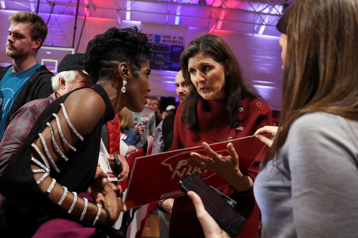 Republican presidential candidate and former U.S. Ambassador to the United Nations Nikki Haley speaks with a supporter during a campaign visit ahead of the South Carolina Republican presidential primary election in Mauldin, South Carolina, US, January 27, 2024.  — Reuters