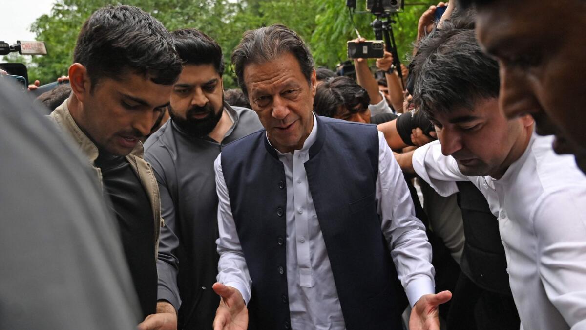 Former Pakistani prime minister Imran Khan arrives to appear before an anti-terrorist court in Islamabad on Saturday. — AFP