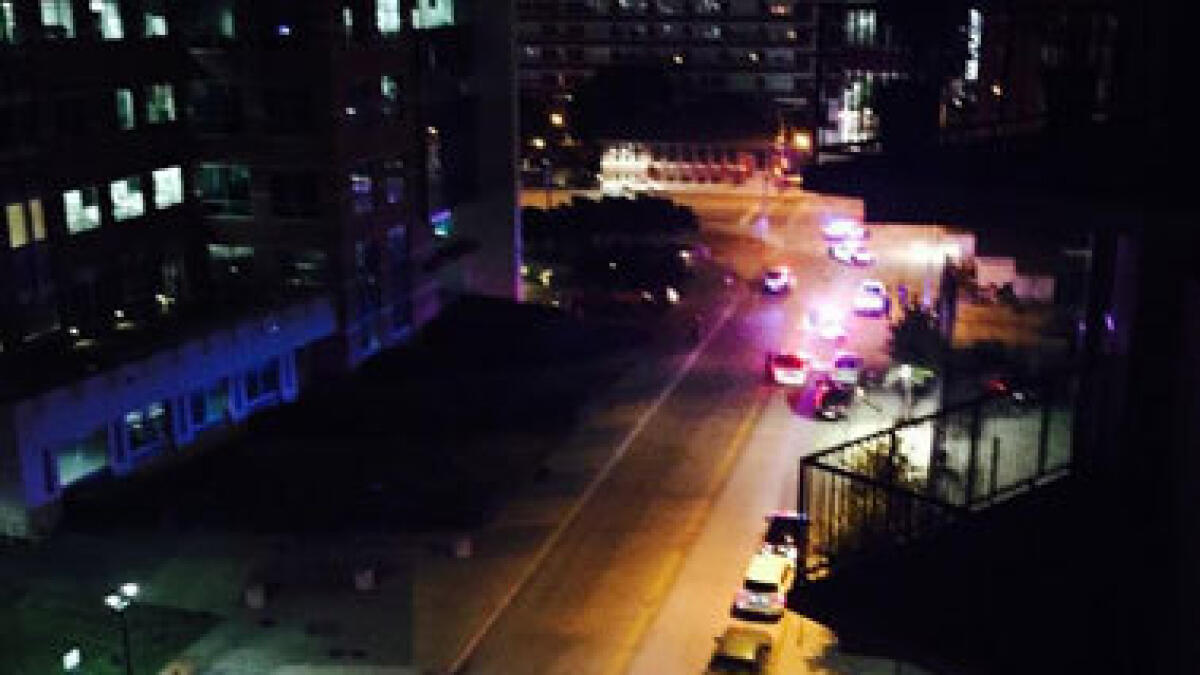 Dallas police headquarters attacked; sniper shoots suspect dead