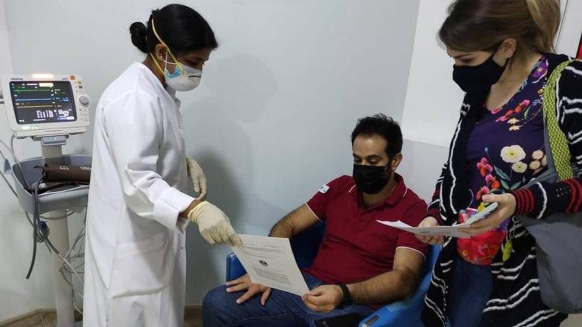 Residents take the Covid-19 vaccine at Bareen International Hospital in Mohamed Bin Zayed City, Abu Dhabi. — File photo