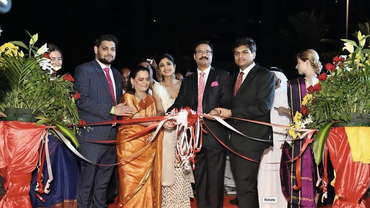 Dhananjay Datar and family inaugurate one of Al Adil Trading's new stores.