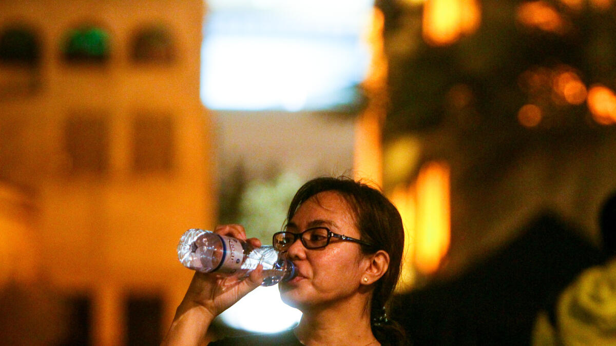 KEEPING HYDRATED... A participant drinking water during the RunMadan Challenge.