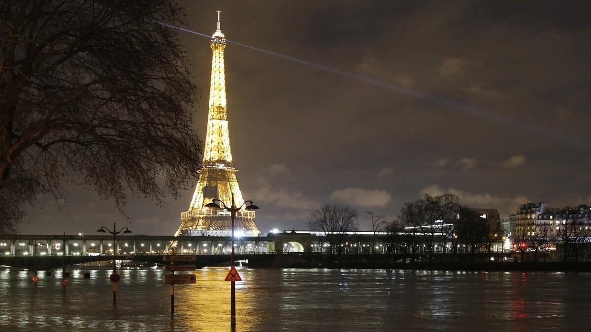 French towns swim in rising floodwaters