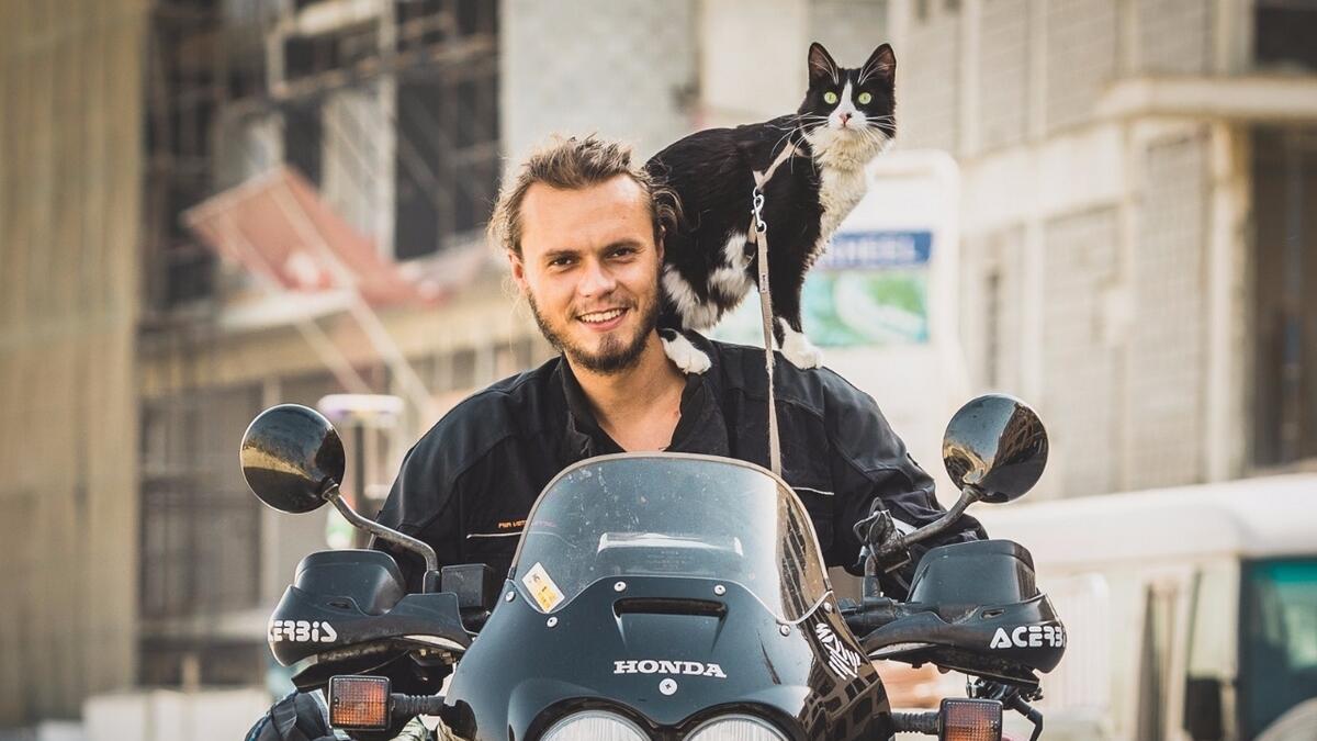 Video: From Germany to Dubai, a man and his cat embark on a motorbike adventure