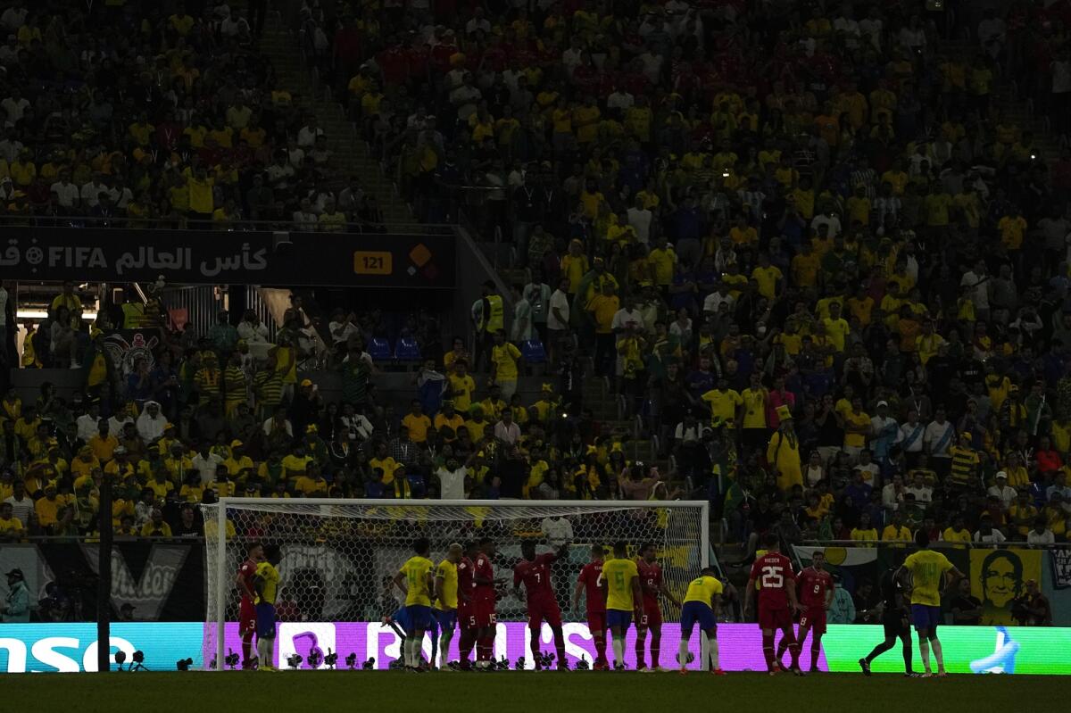 Lights of the stadium are off during the World Cup group G soccer, at the Stadium 974 in Doha, Qatar, Monday, Nov. 28, 2022. Photo: AP