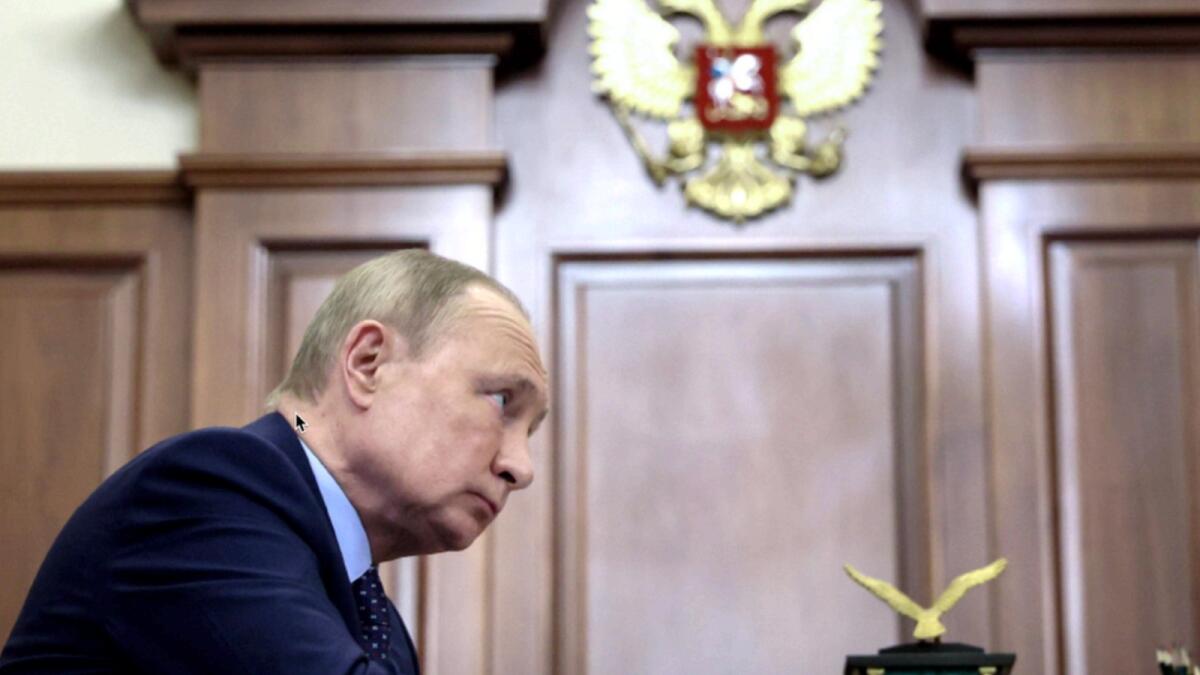 Russian President Vladimir Putin listens during a meeting in the Kremlin in Moscow. — AP