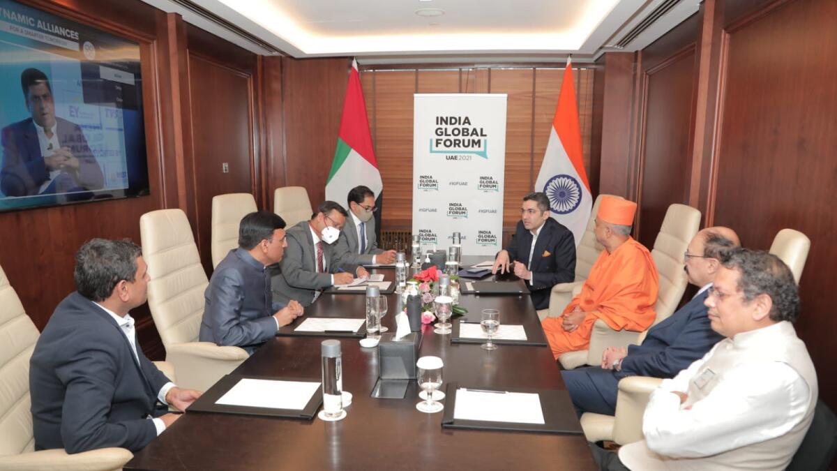Harsh Vardhan Shringla, India Foreign Secretary, with Sunjay Sudhir, India Ambassador to the UAE, and BAPS Swaminarayan.