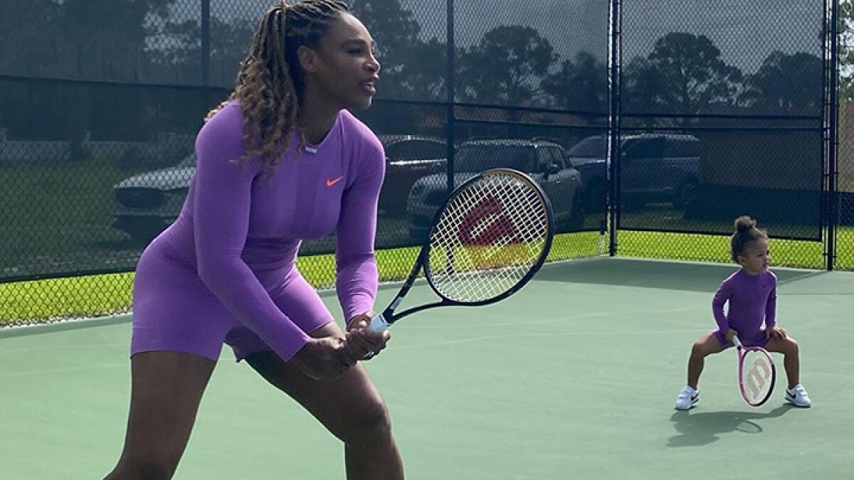 Serena Williams with her two-year-old daughter Alexis Olympia Ohanian Jr., who was seen as her doubles partner at the tennis court. -- Twitter