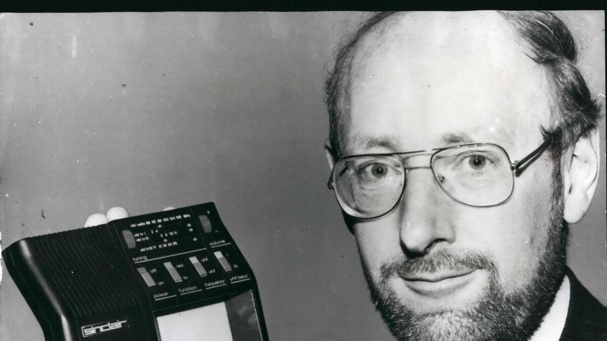 Clive Sinclair shows his pocket television, which is fitted with a special flat tube, in 1981. — Alamy Stock photo