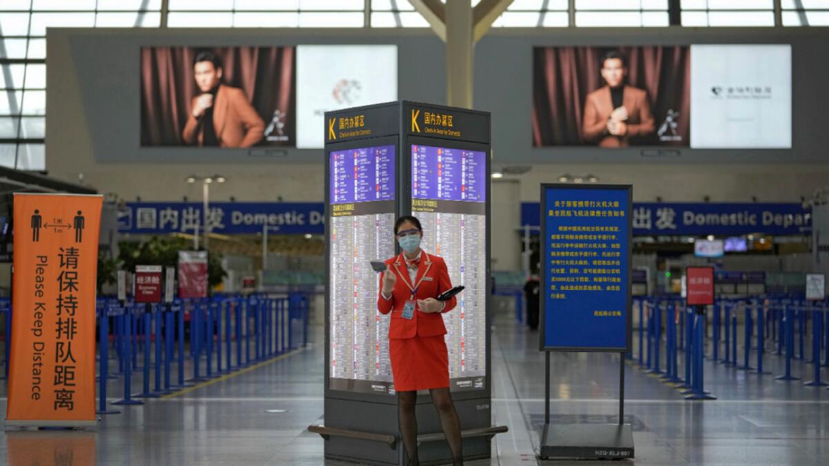 An airline staff at the Pudong International Airport in Shanghai.