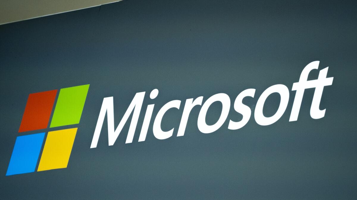 Starting in February, some new personal computers that run Microsoft's Windows operating system will have a special 'Copilot key' that launches the software giant's AI chatbot. (AP Photo/Joan Mateu Parra, File)