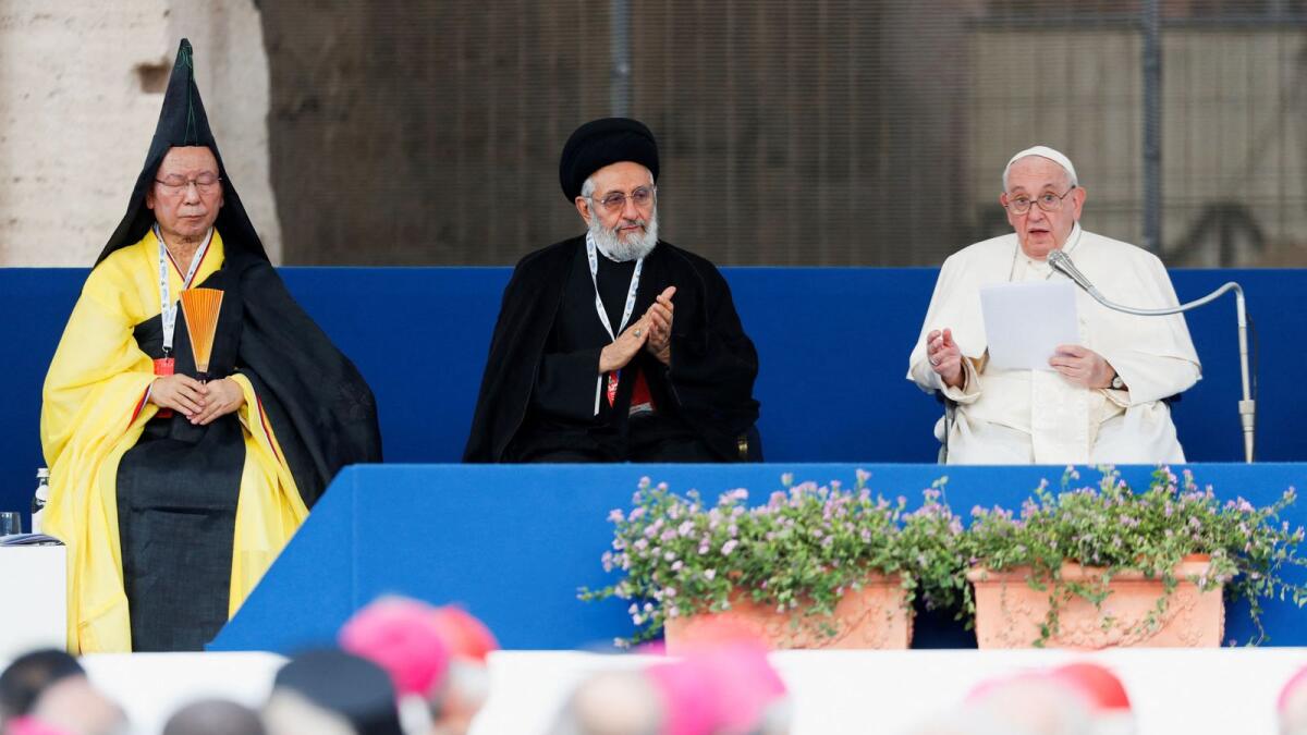 Director of the European Bureau of Soto Zen Buddhism Shoten Minegishi and Sayyed Abu Al Qasim Al Dibaj of the World Pan-Islamic Jurisprudence Organization attend an inter-religious prayer for peace led by Pope Francis, at the Colosseum in Rome. — Reuters
