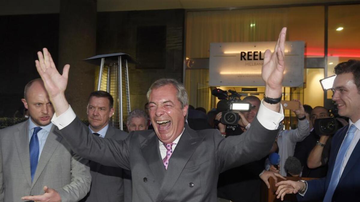 Nigel Farage, the leader of the United Kingdom Independence Party (UKIP), reacts at a Leave.eu party after polling stations closed in the Referendum on the European Union in London.