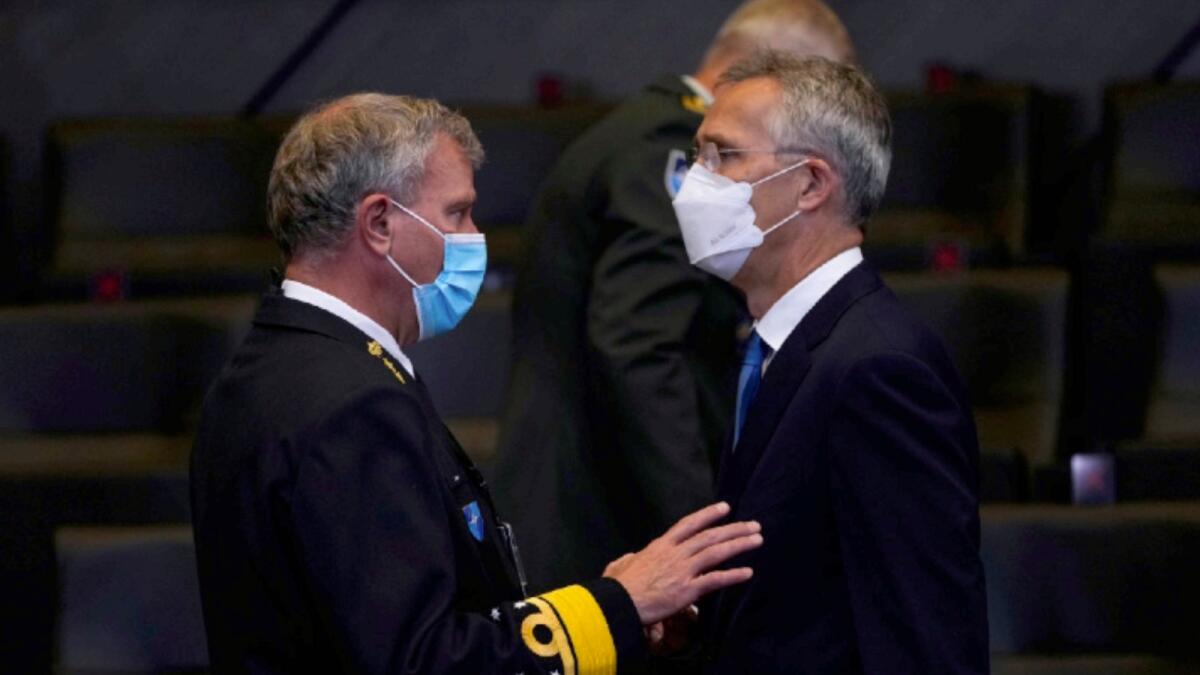 NATO Secretary General Jens Stoltenberg, right, talks to Chair of the NATO Military Committee Admiral Rob Bauer during a NATO Foreign Ministers meeting  at the NATO headquarters in Brussels. Photo: AP