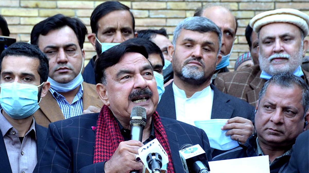 Interior Minister Sheikh Rashid Ahmed talking to media in Islamabad on Wednesday.