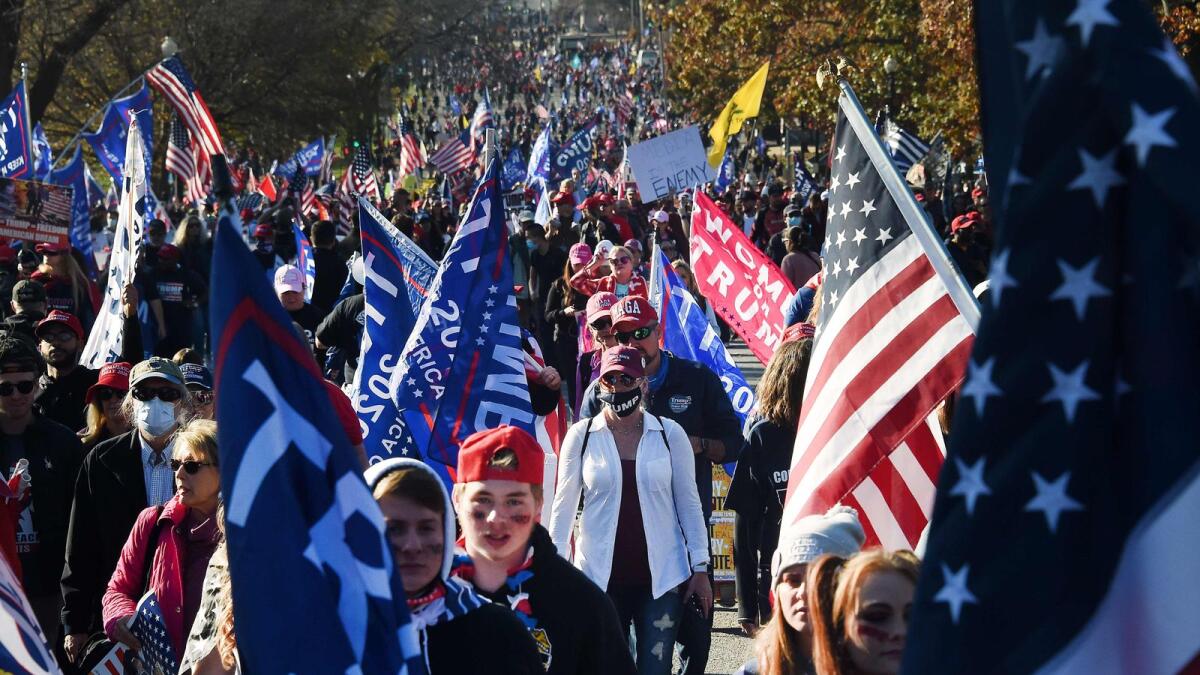 Supporters of US President Donald Trump rally in Washington, DC, on November 14, 2020. AFP