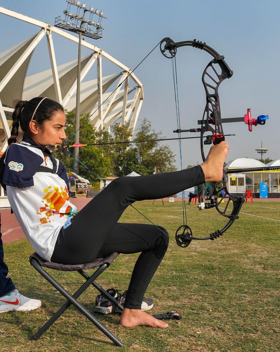Armless archer Sheetal Devi from Jammu &amp; Kashmir) at the Khelo India Para Games, in New Delhi. - PTI