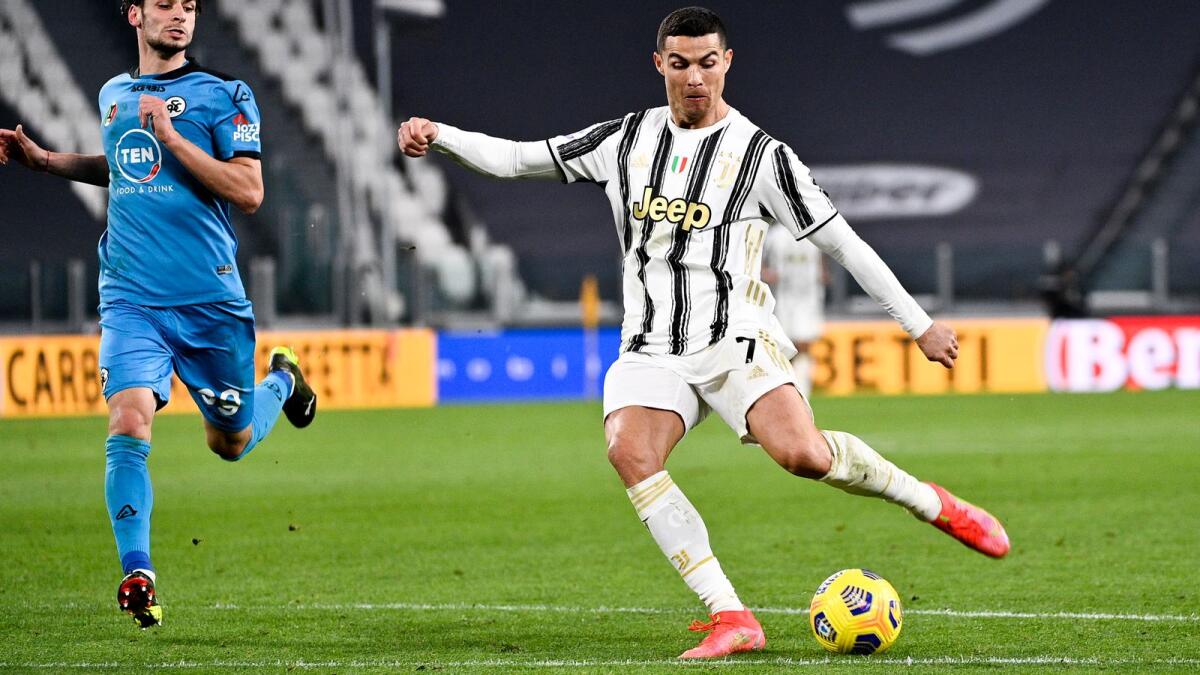 Cristiano Ronaldo scores a goal against Spezia. (AP)