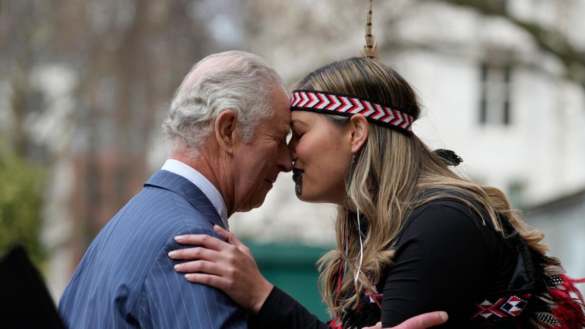 King Charles III is greeted by a member of a Maori group as he arrives to attend the annual Commonwealth Day service at Westminster Abbey in London, Monday, March 13, 2023. — AP file