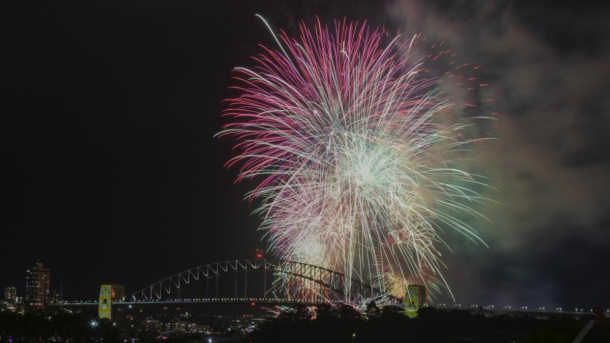 Fireworks explode over the Sydney Harbour as early New Year celebrations begin in Sydney. — AP