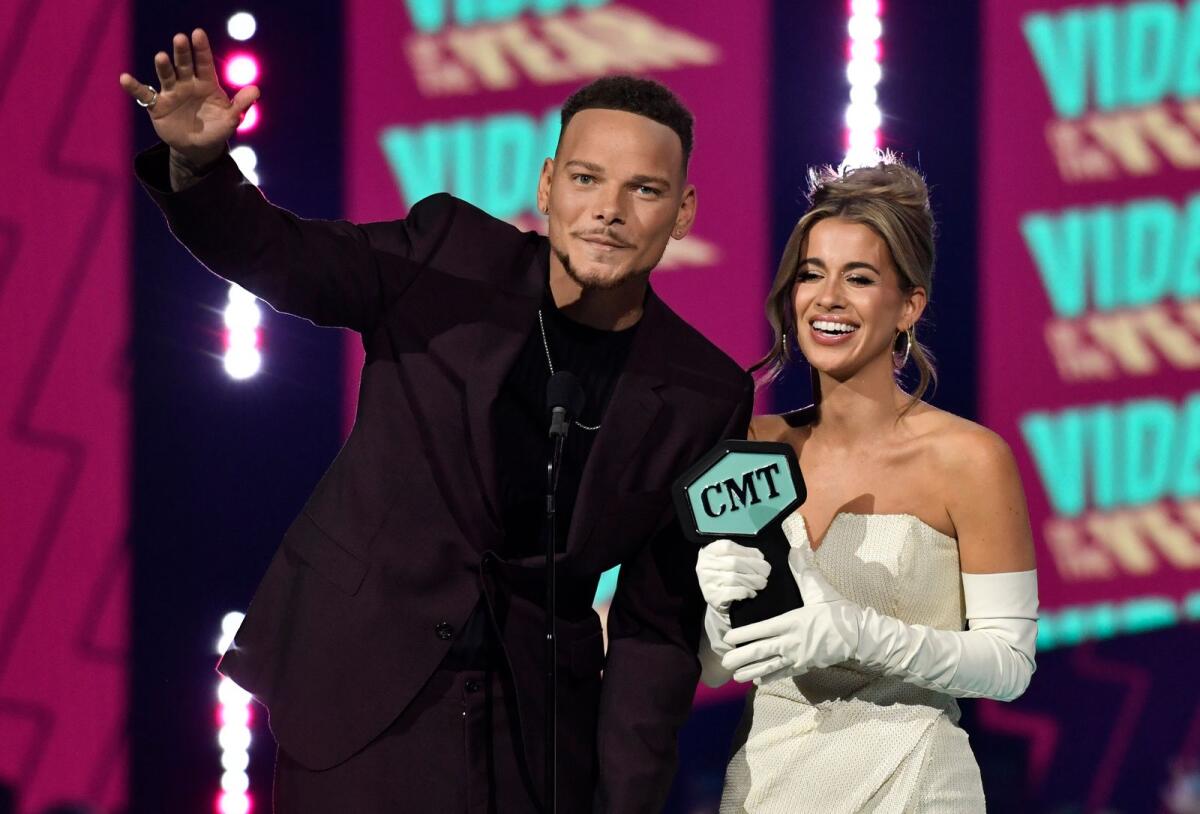 Kane Brown, left, and Katelyn Brown accept the award for video of the year for 'Thank God'