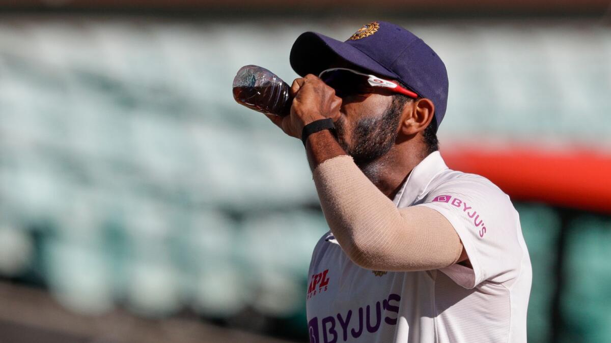 Jasprit Bumrah takes a drink during day three of the third Test. — AP