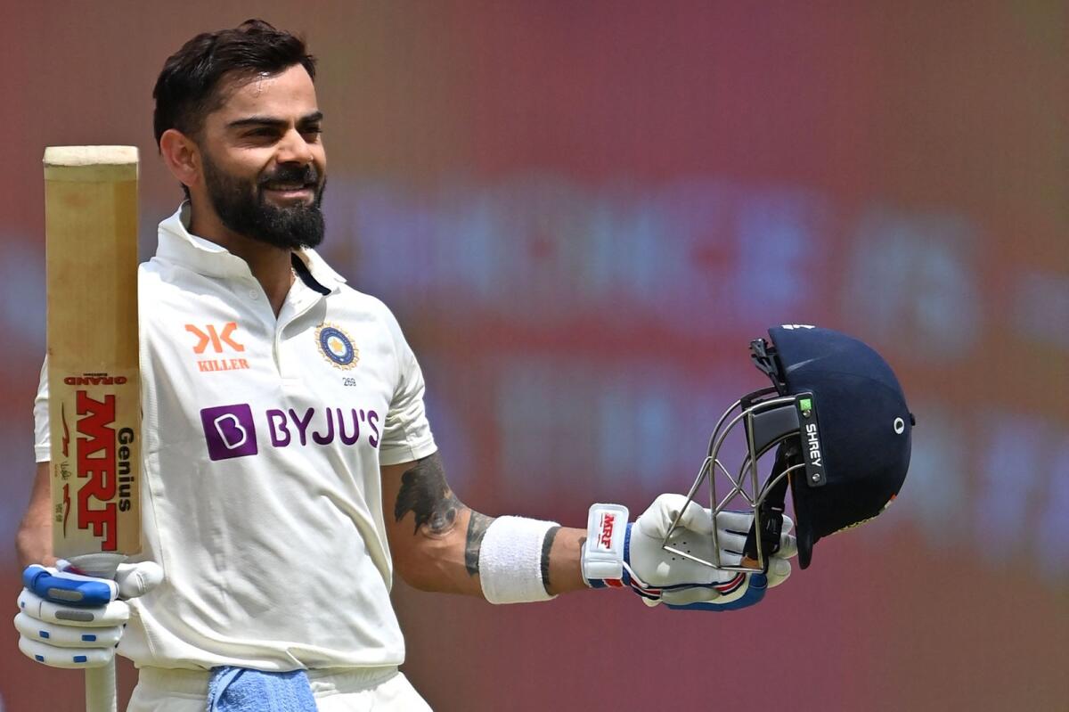 Virat Kohli celebrates after scoring a century during the fourth Test against Australia in Ahmedabad on March 12, 2023. — AFP