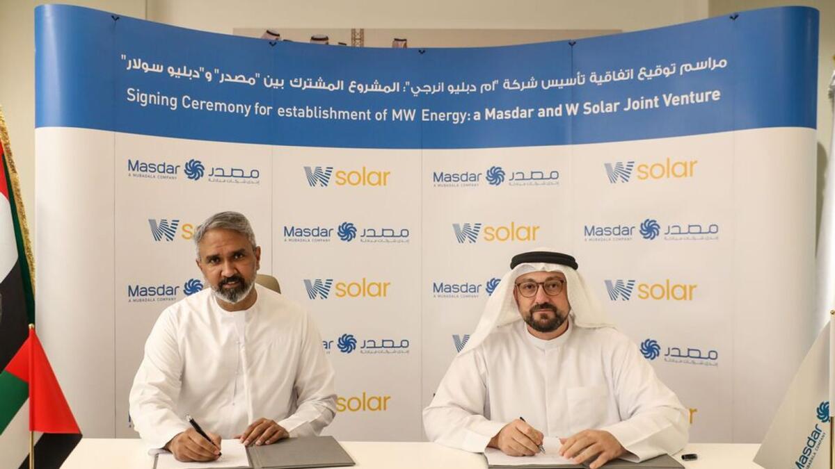 Mohamed Jameel Al Ramahi, chief executive officer of Masdar, and Syed Basar Shueb, vice-chairman of Alpha Dhabi Holding, at the signing ceremony held recently in Masdar City. — Supplied photo