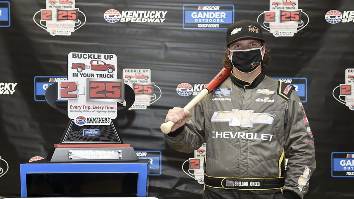 Chevy Accessories Chevrolet, celebrates in Victory Lane after winning the weathered delayed NASCAR Gander RV &amp; Outdoors Truck Series Buckle Up In Your Truck 225 at Kentucky Speedway on July 11, 2020 in Sparta, Kentucky.   Photo: AFP