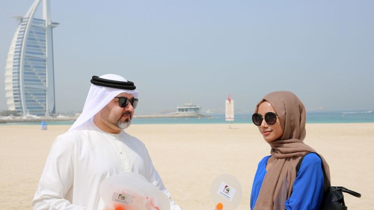 Fans distributed to Dubai parks and beach visitors