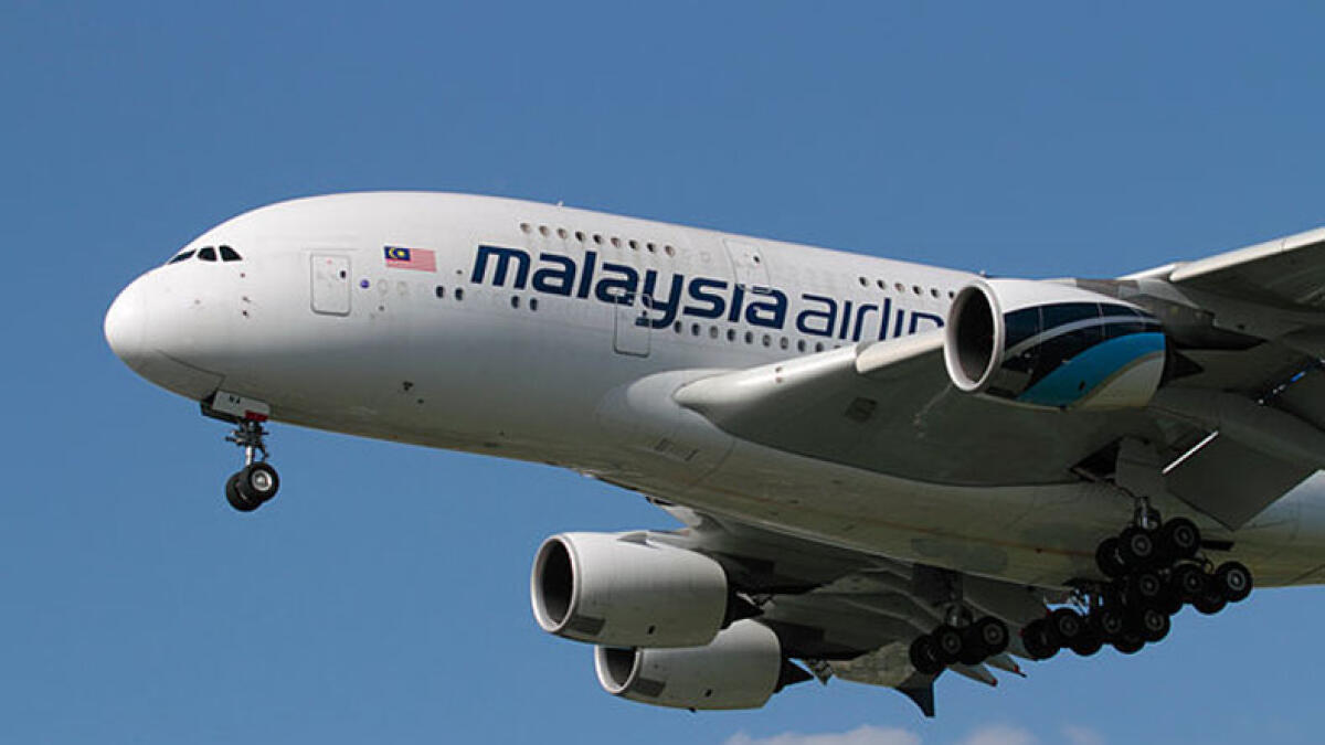 Malaysia Airlines flight shakes violently, forced to land