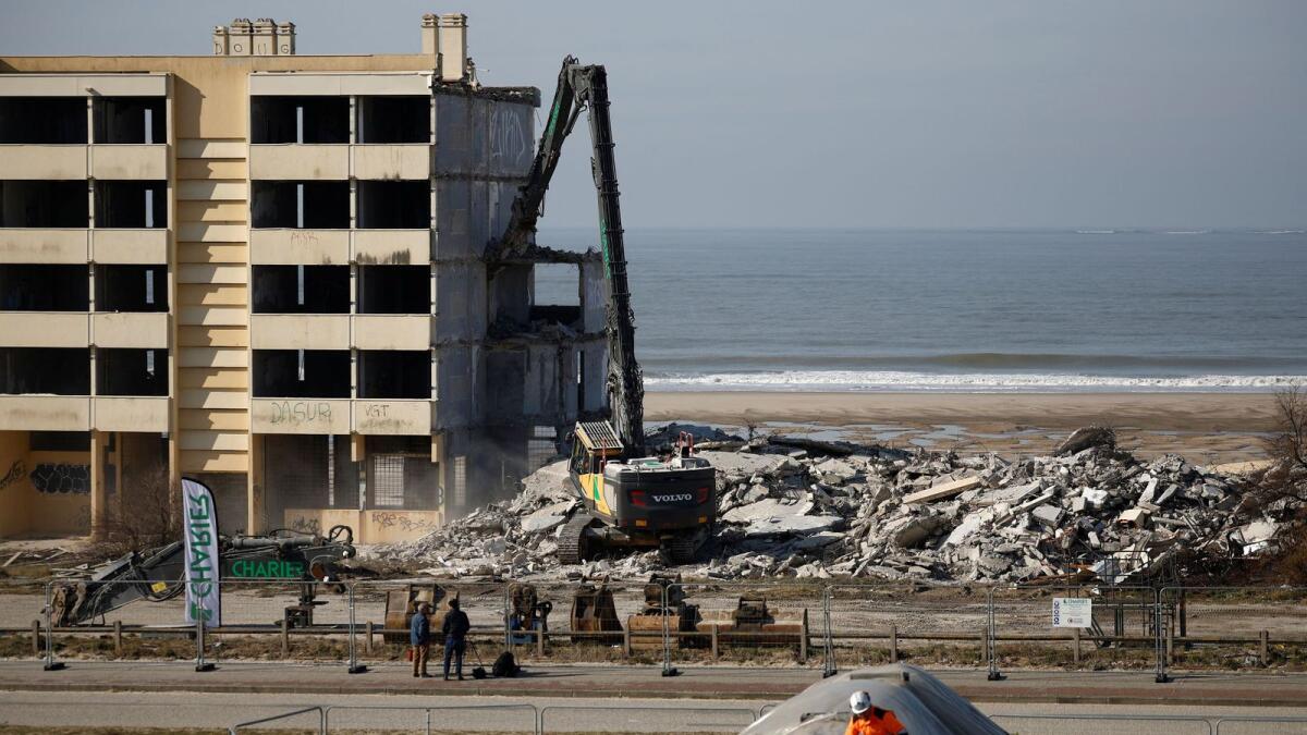 A view shows the demolition of the Signal building on the Atlantic Ocean coast in Soulac-sur-Mer, France. — Reuters