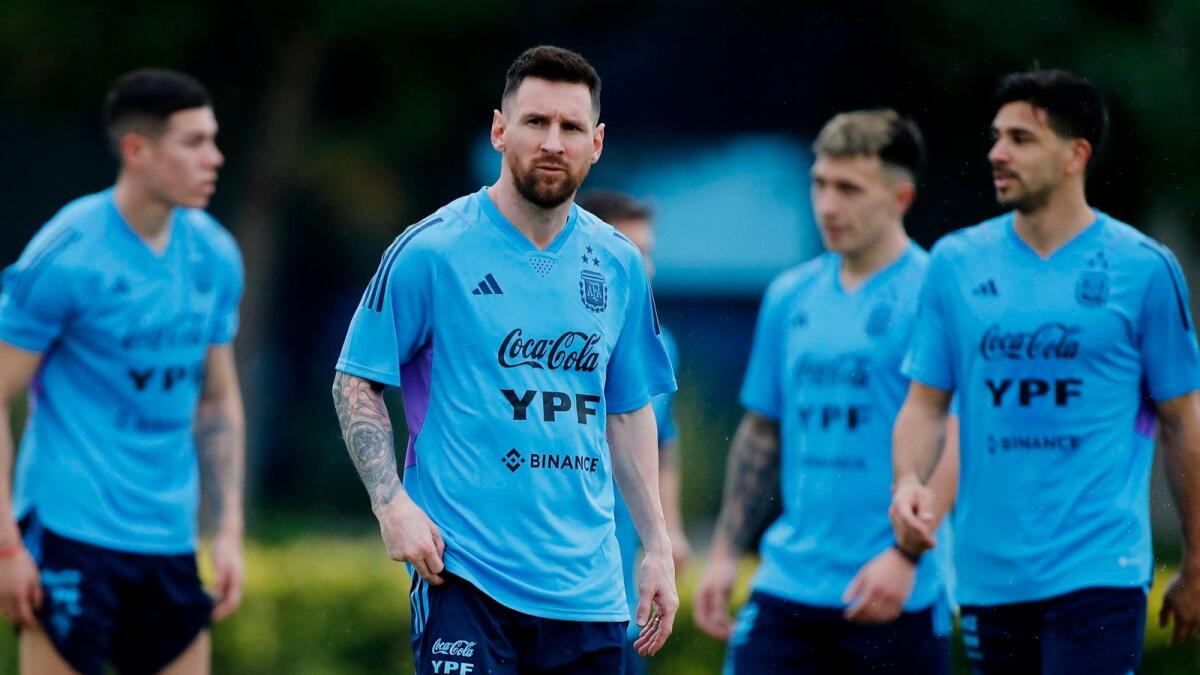 Argentina's Lionel Messi with his teammates during a training session. — Reuters
