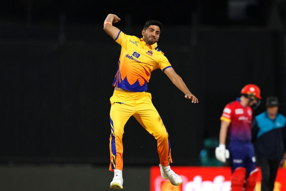 Junaid Siddique of Sharjah Warriors celebrates the wicket of Bhanuka Rajapaksa of Dubai Capitals. — Supplied photo