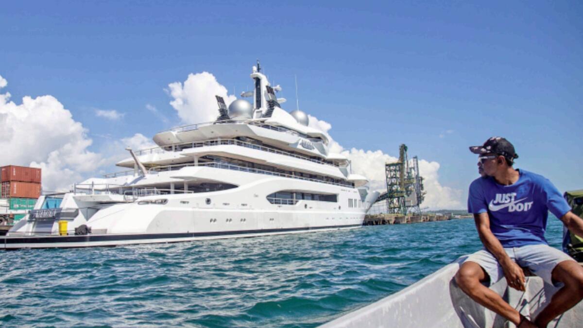 Boat captain Emosi Dawai looks at the superyacht Amadea where it is docked at the Queens Wharf in Lautoka, Fiji. — AP file
