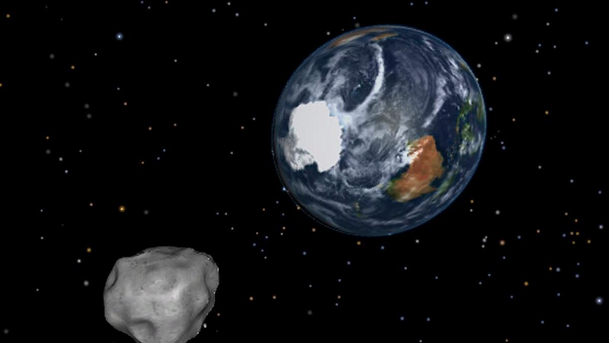 This image provided by Nasa/JPL-Caltech shows a simulation of asteroid 2012 DA14 approaching from the south as it passes through the Earth-moon system on Feb. 15, 2013.